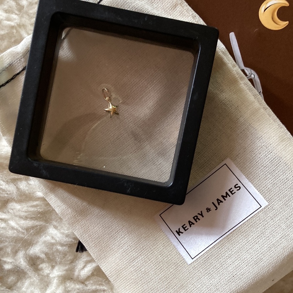 Keary and James puffy star charm 14 k
